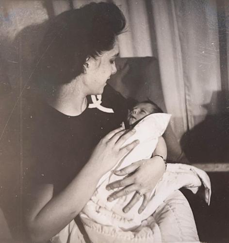 Baby Bobby is 8 days old (1947) and is held by his mother, Thelma.