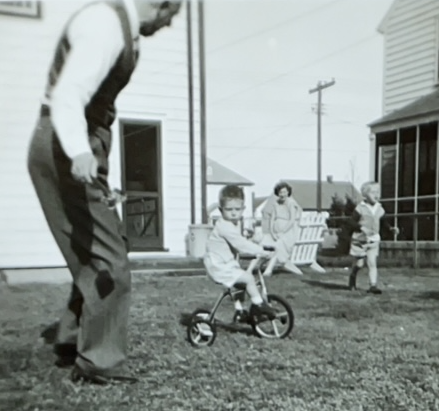 Bobby rides a bike — with Harry Funk and aunt Ruth Funk and cousin Buddy Funk, April 1949.