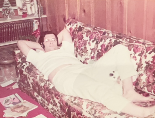 Bob lounges with Ming, the Smiths' Pekinese pup, at the Smiths' home in Clarksville, Tennessee, circa 1974.