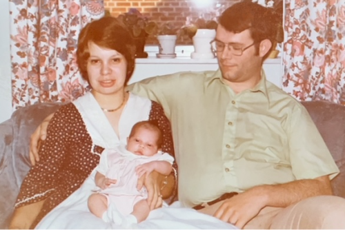 Beckie and Bob, and Baby Andrea makes three! Andrea is 18 days old at their home in Cincinnati, Ohio, November 1975.