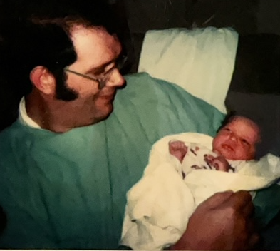Bob holds his new daughter, Ashley, at 5 days old, in Nashville, Tennessee, October 1979.