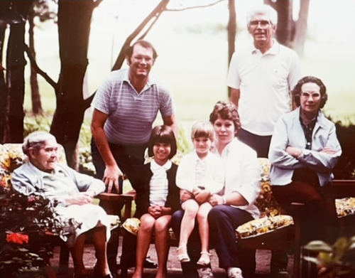 Visiting Great Grandmother Hultman: Mabel (Morgan) Hultman, Bob, Andrea, Ashley, Beckie, Gus, and Thelma in Cadillac, Michigan, July 1984.