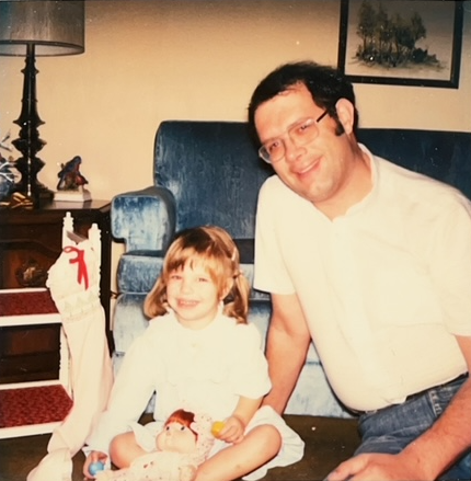 Ashley and Bob pause mid-Christmas morning fun -- Nashville, Tennessee, early to mid 1980s.