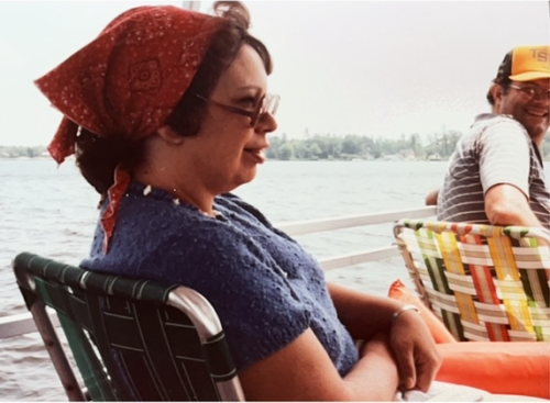 A breezy but fun ride on the lake after arriving to Cadillac from Frankenmuth: Beckie and Bob on Gus's pontoon boat, July 1986.