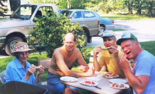 Thelma, Richard, Randy, and Bob celebrate a good garage sale day in Cadillac, July 1999.